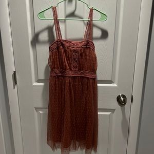 Medium Maurice’s mauve pink tulle dress with macrame detail.